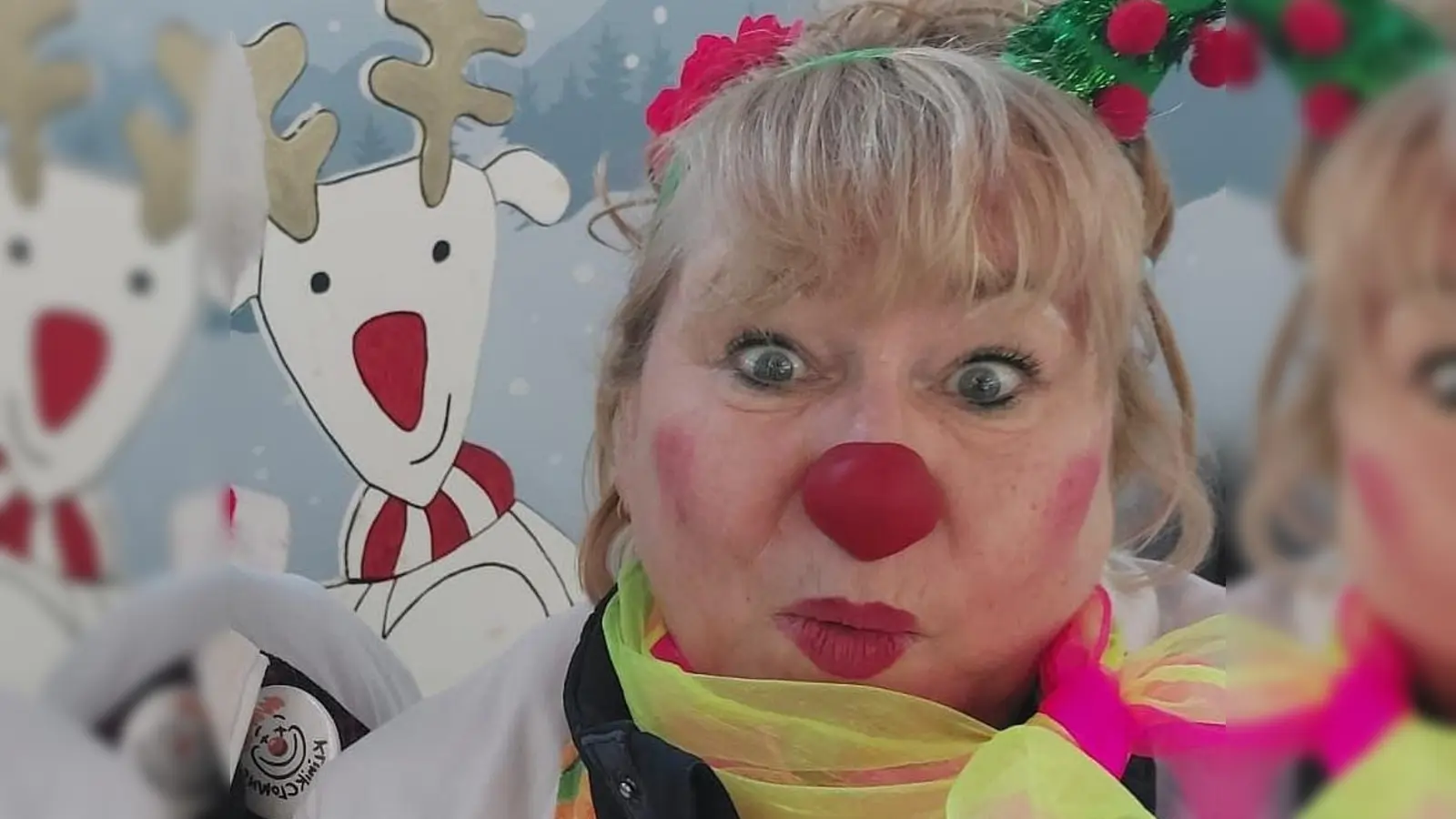 Sie schenken auch auf dem Schwabinger Weihnachtsmarkt ein Lächeln – die KlinikClowns. (Foto: KlinikClowns Bayern e.V.)